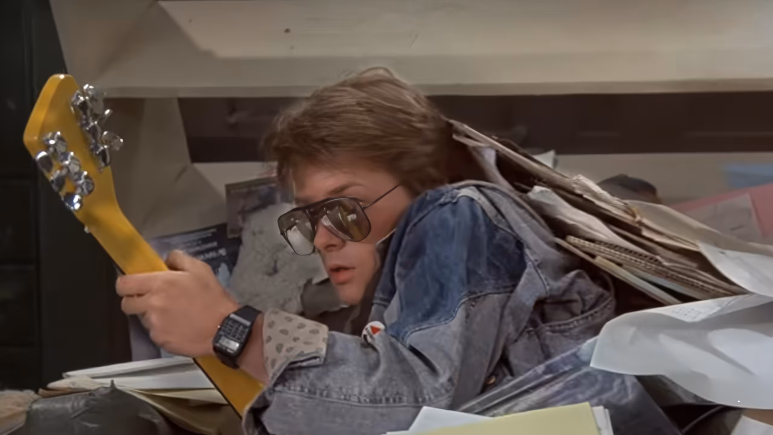 Michael J. Fox wearing Casio CA-50 in Back to the Future