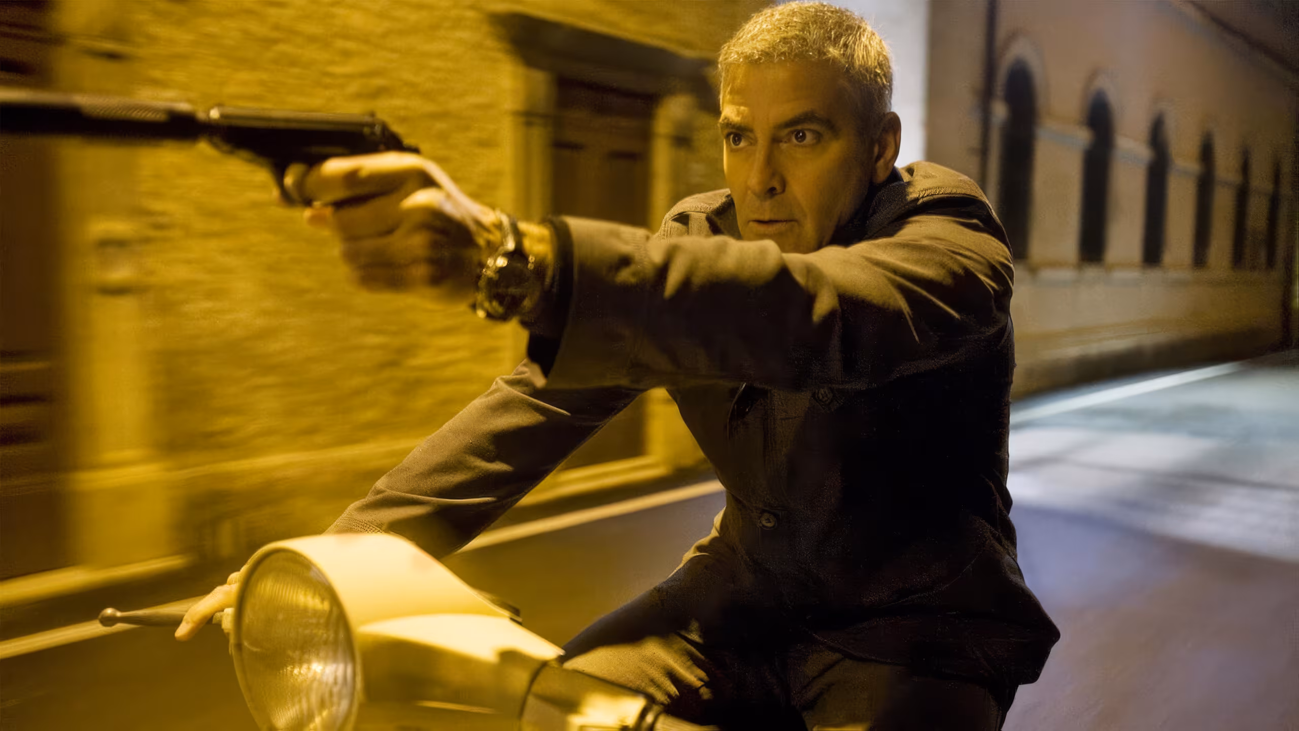 George Clooney wearing Omega Speedmaster Professional in The American
