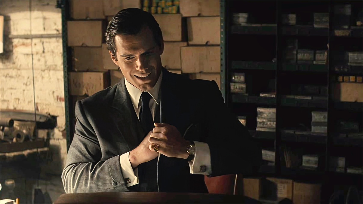 Henry Cavill wearing Omega Vintage Gold Chronograph in The Man from U.N.C.L.E.