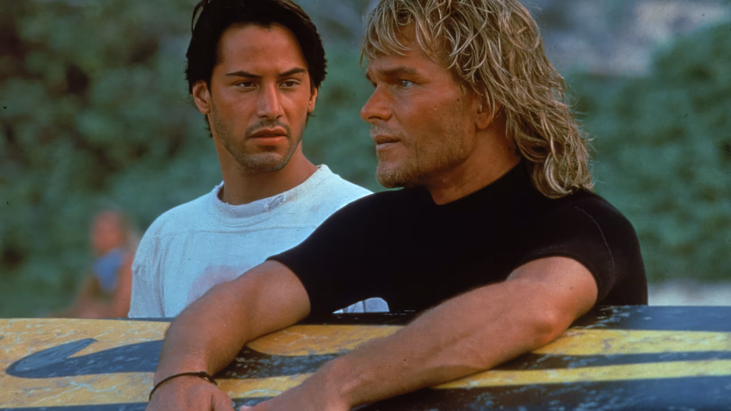 Patrick Swayze wearing Breitling Navitimer Pluton in Point Break