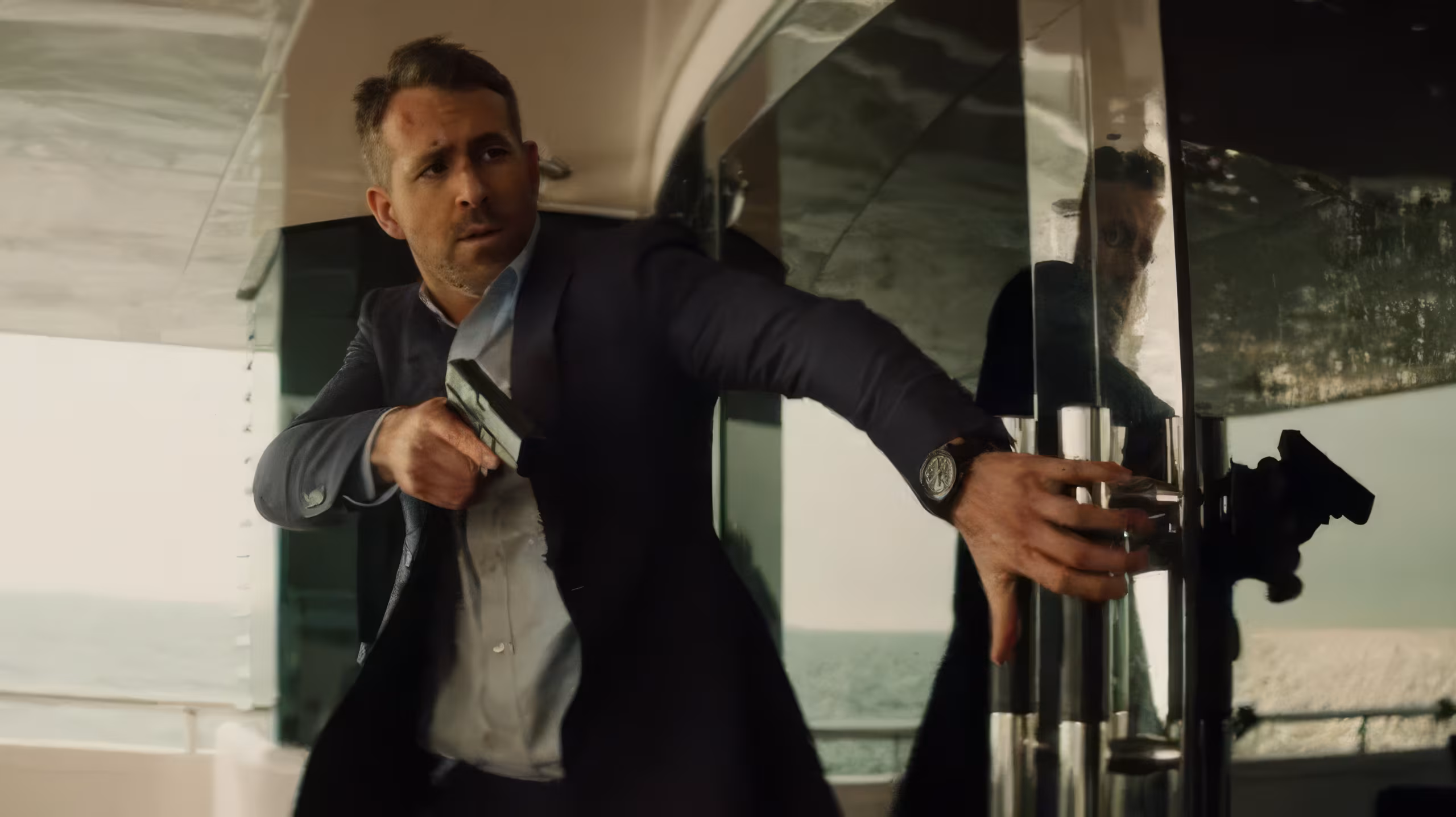 Ryan Reynolds wearing Omega Speedmaster in Hitman's Wife's Bodyguard
