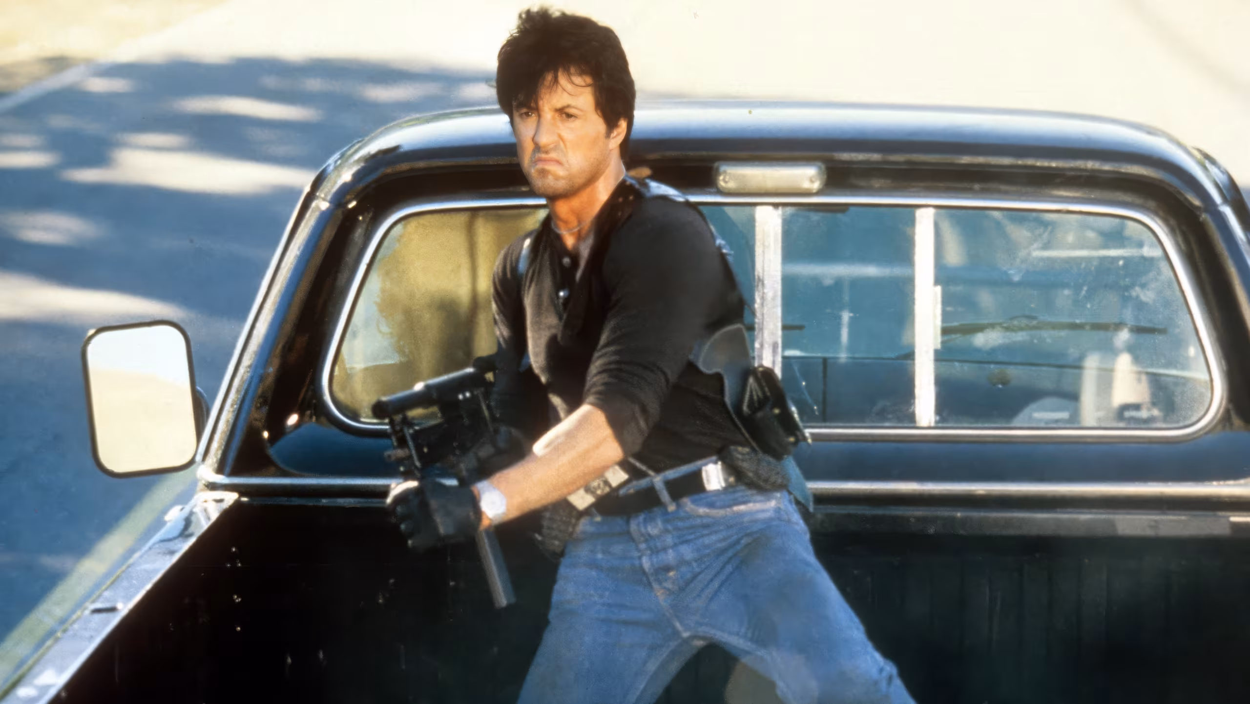 Sylvester Stallone wearing Heuer 2000 Series Professional in Cobra