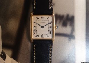 Alain Delon wearing Cartier Tank Arrondie in Un Flic (A Cop)