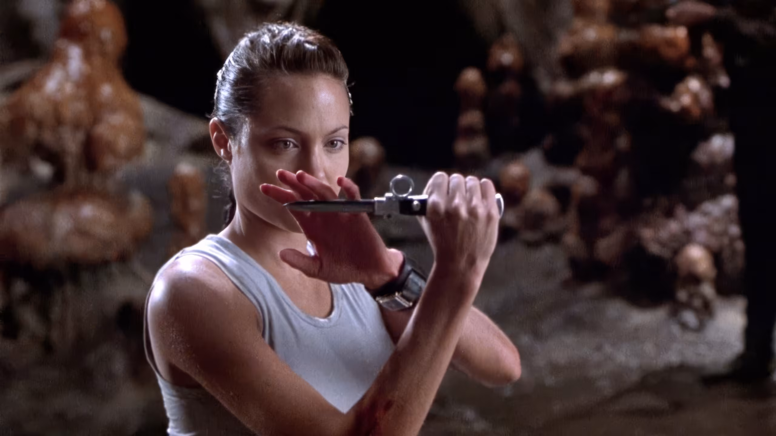 Angelina Jolie wearing Cartier Tank in Lara Croft: Tomb Raider