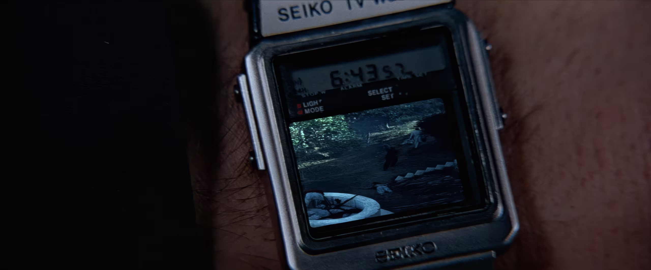 Roger Moore wearing Seiko T001-5000 in Octopussy