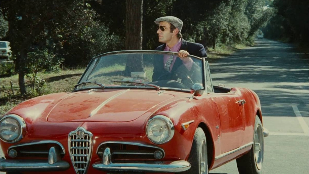 Lino Ventura wearing Cartier Tank in Money Money Money