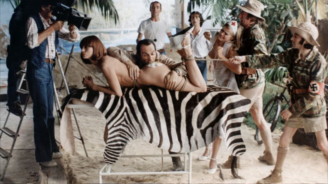 Claude Brasseur wearing Rolex Submariner in Let's Make a Dirty Movie