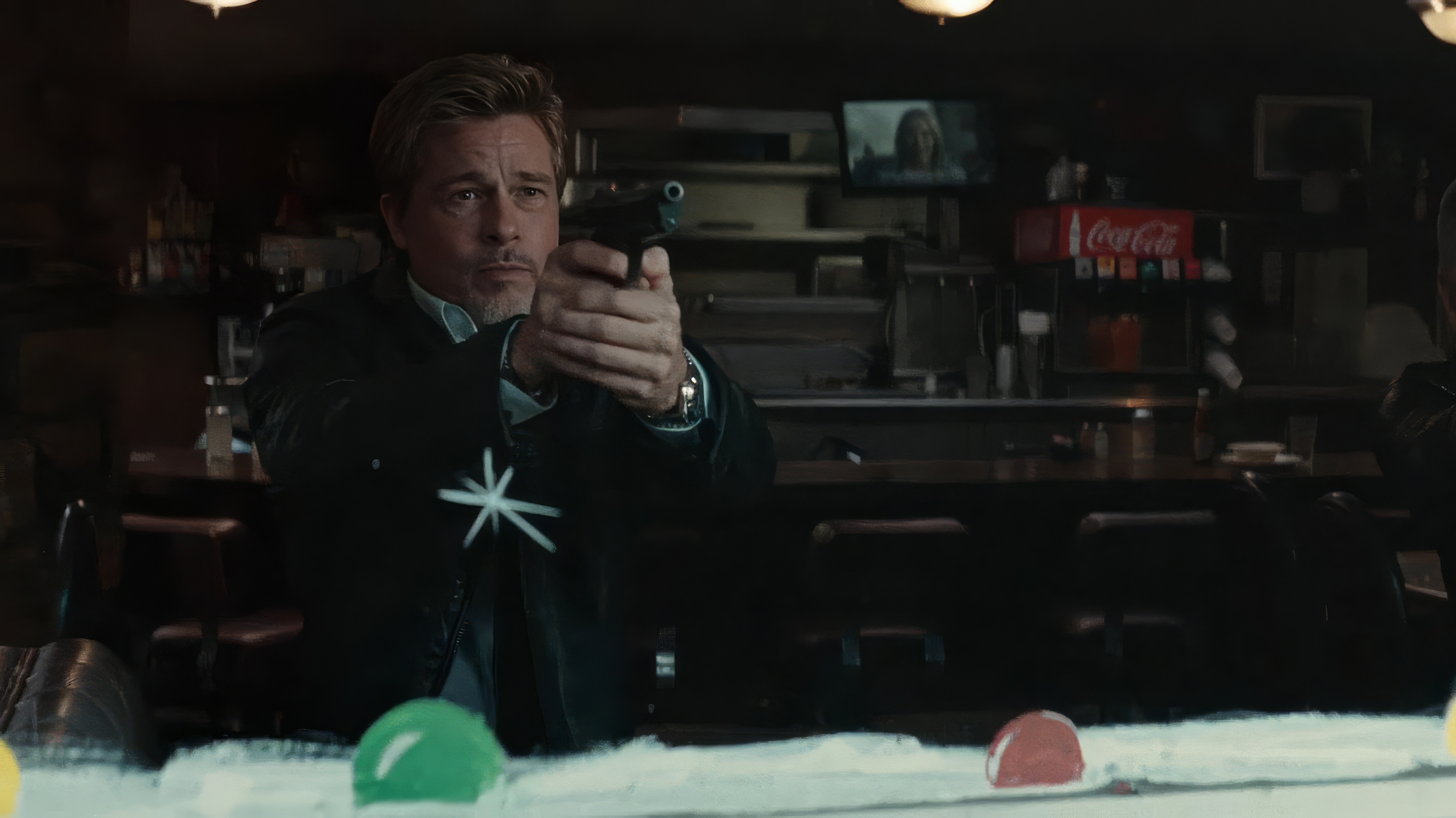 Brad Pitt wearing Breitling Chronomat in Wolfs