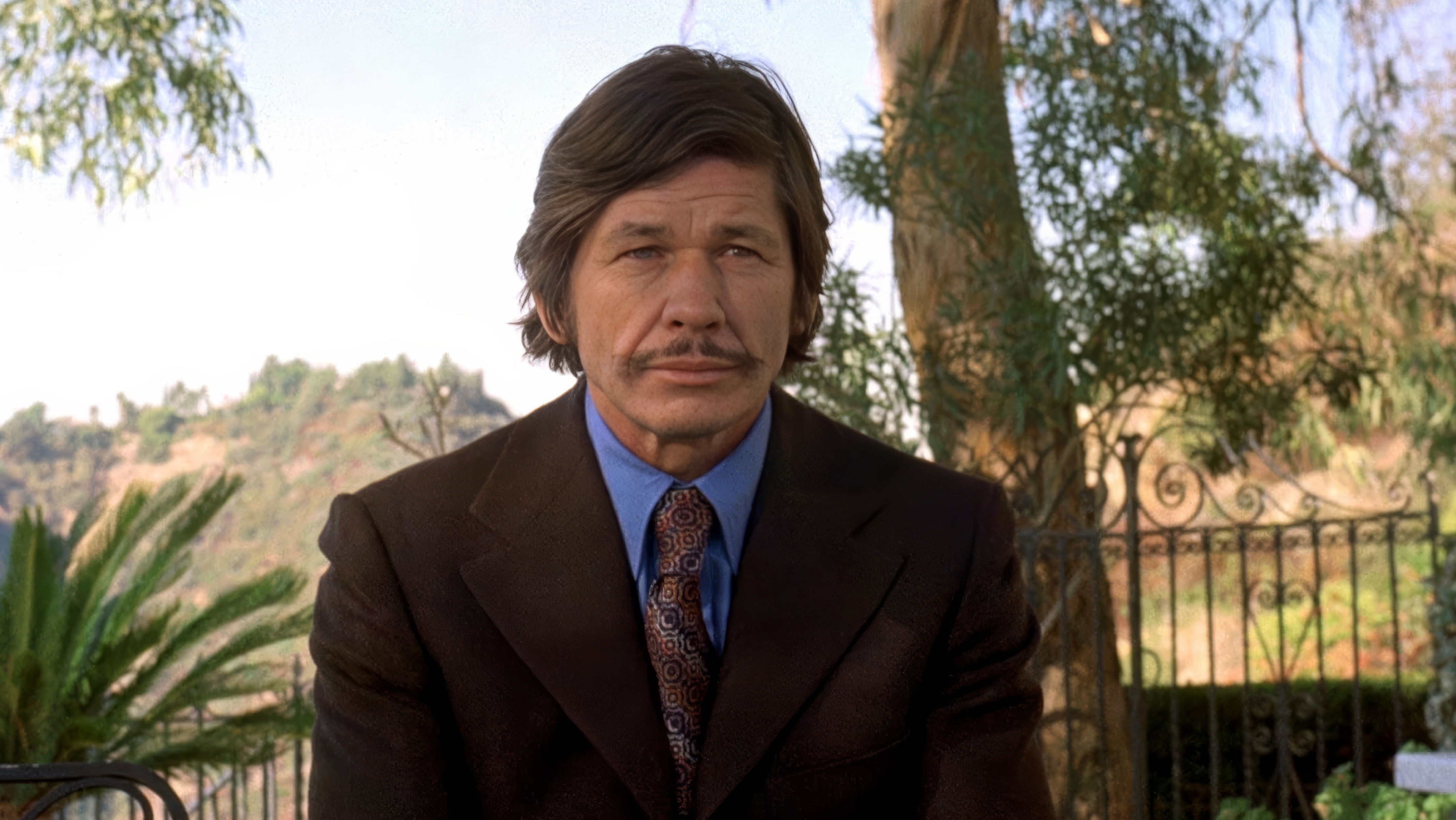 Charles Bronson wearing Heuer Autavia GMT in The Mechanic