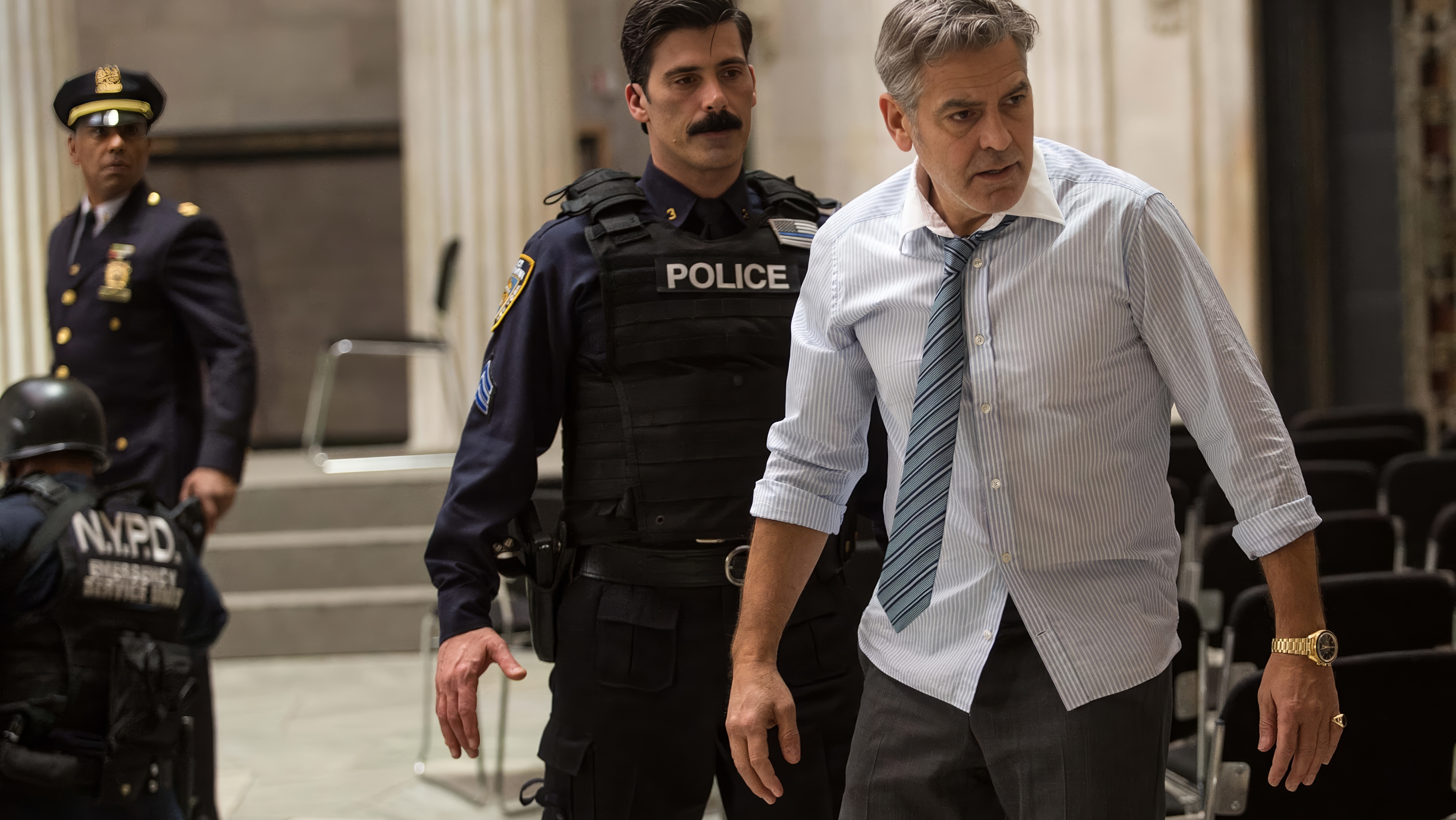 George Clooney wearing Omega Speedmaster Professional in Money Monster
