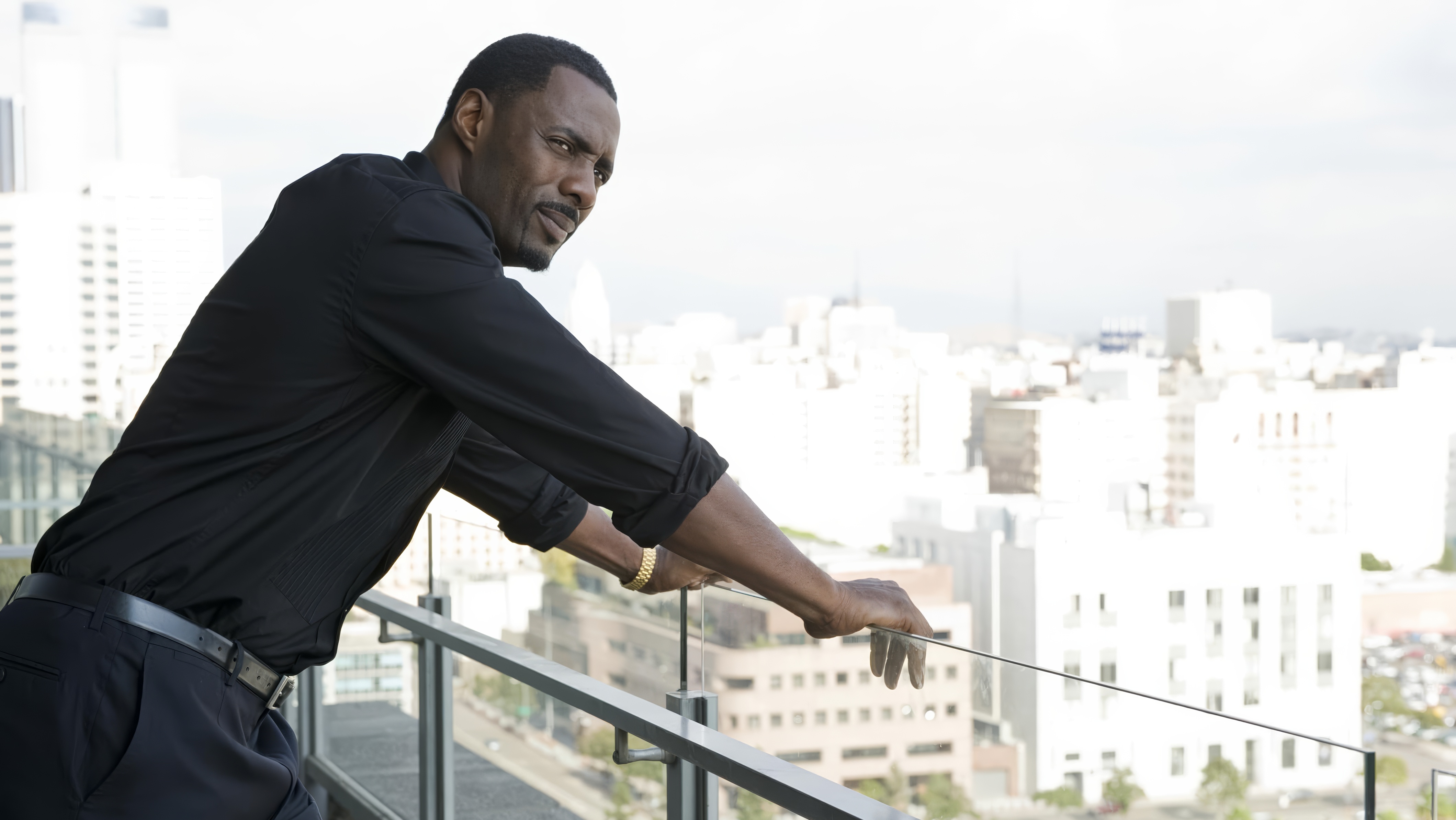 Idris Elba wearing Rolex Day-Date in Takers