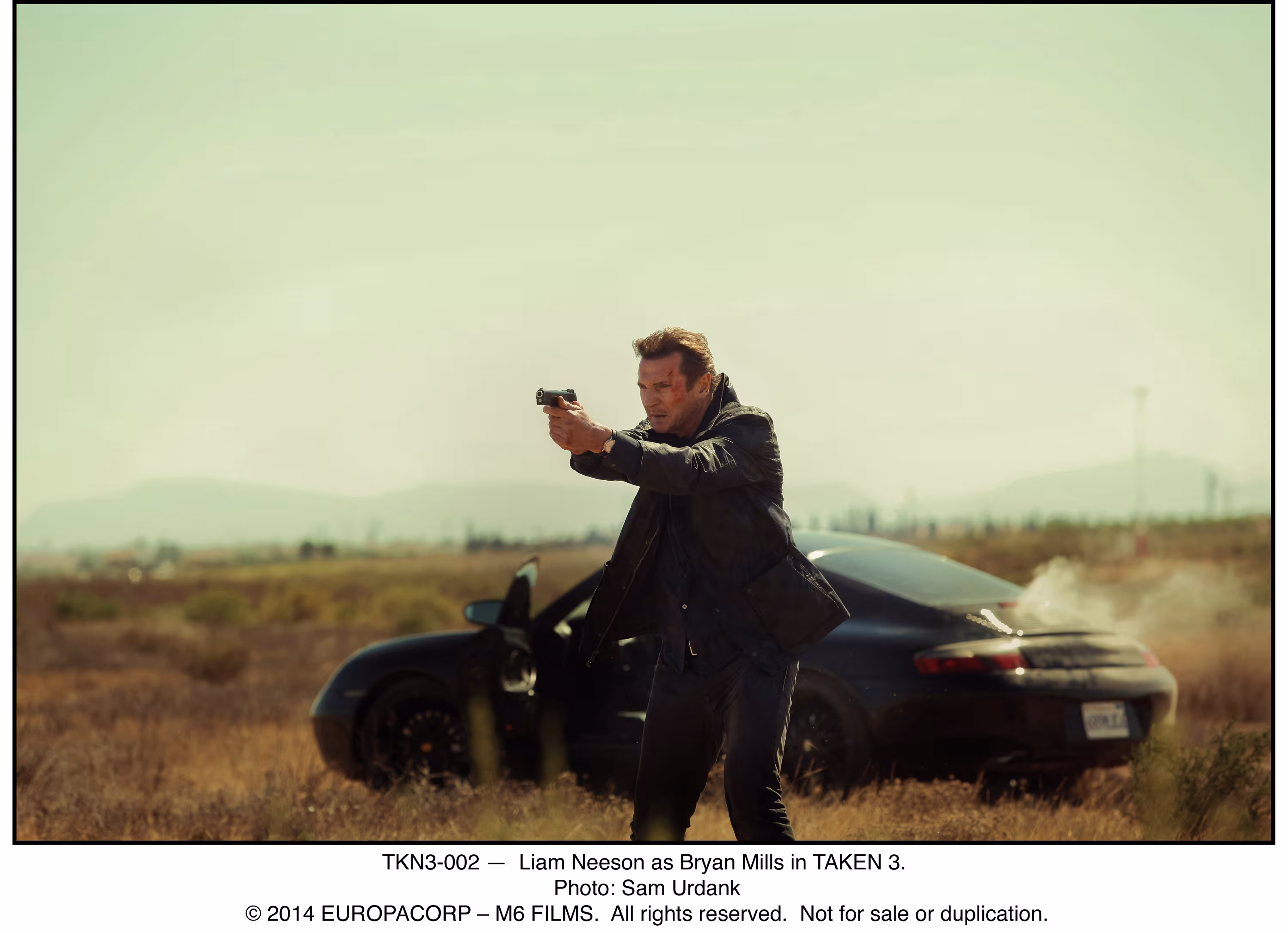 Liam Neeson wearing Hamilton Jazzmaster in Taken 3