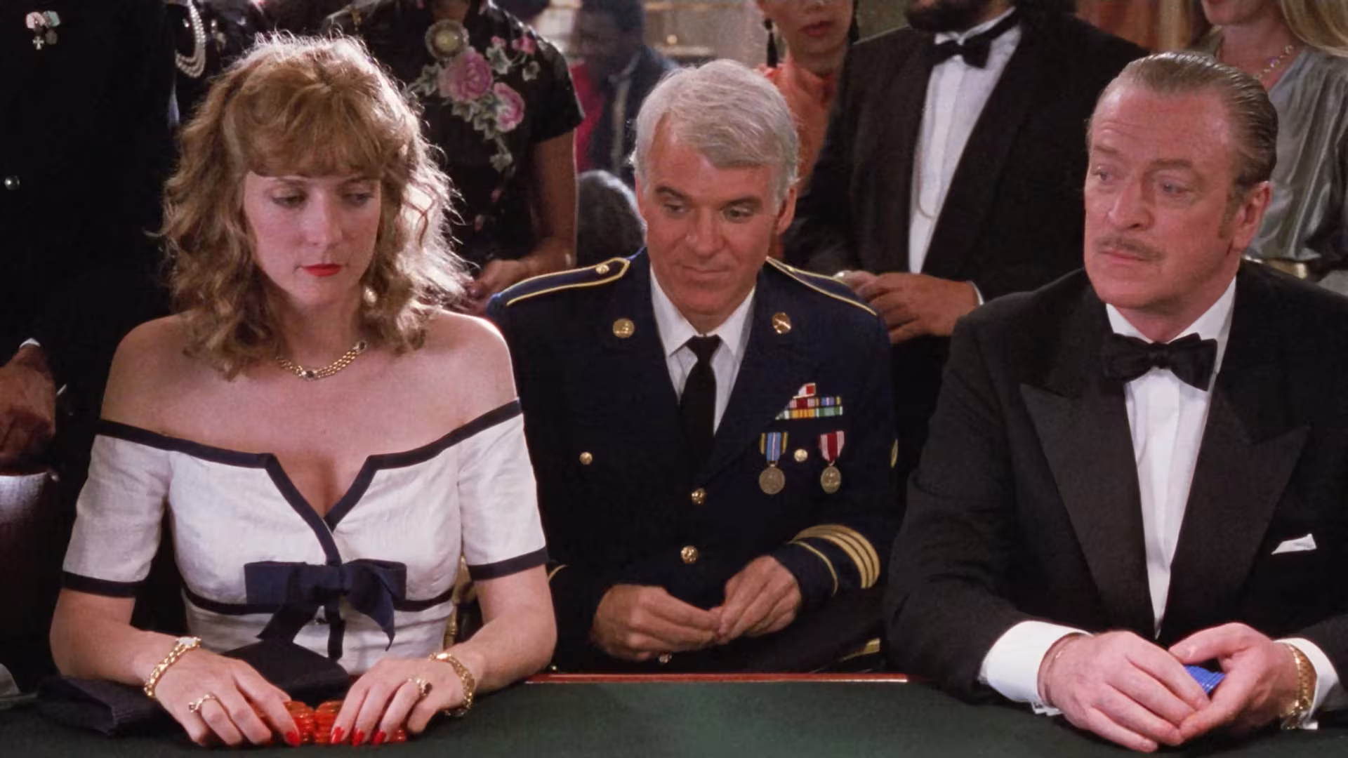 Michael Caine wearing Rolex Day-Date in Dirty Rotten Scoundrels