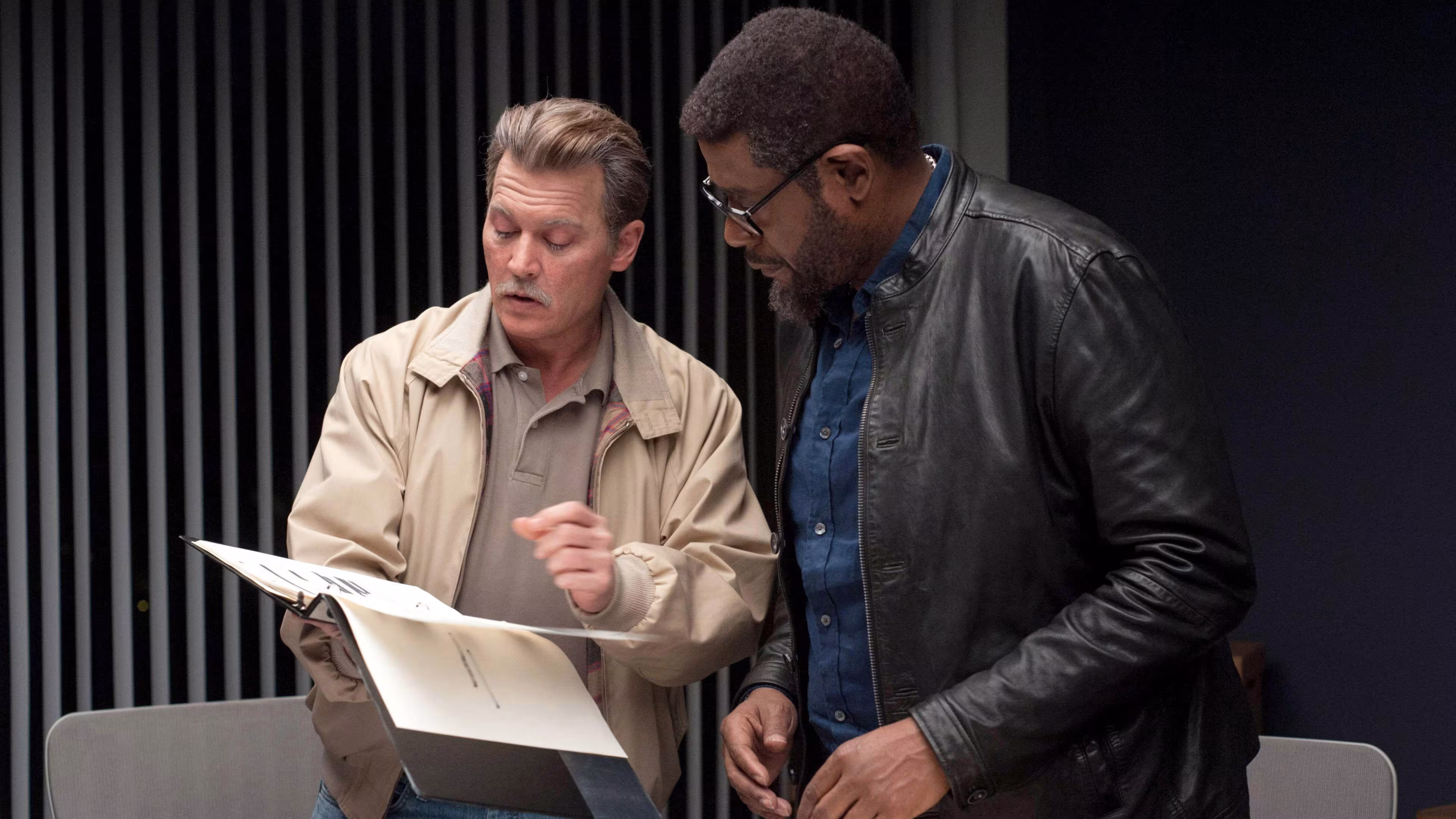 Johnny Depp wearing TAG Heuer Link in City of Lies
