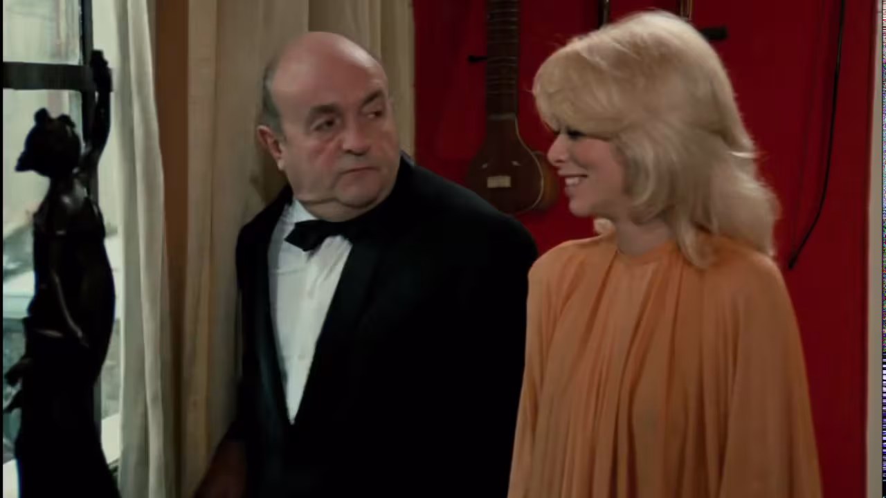 Bernard Blier wearing Cartier Tank in The Tall Blond Man with One Black Shoe