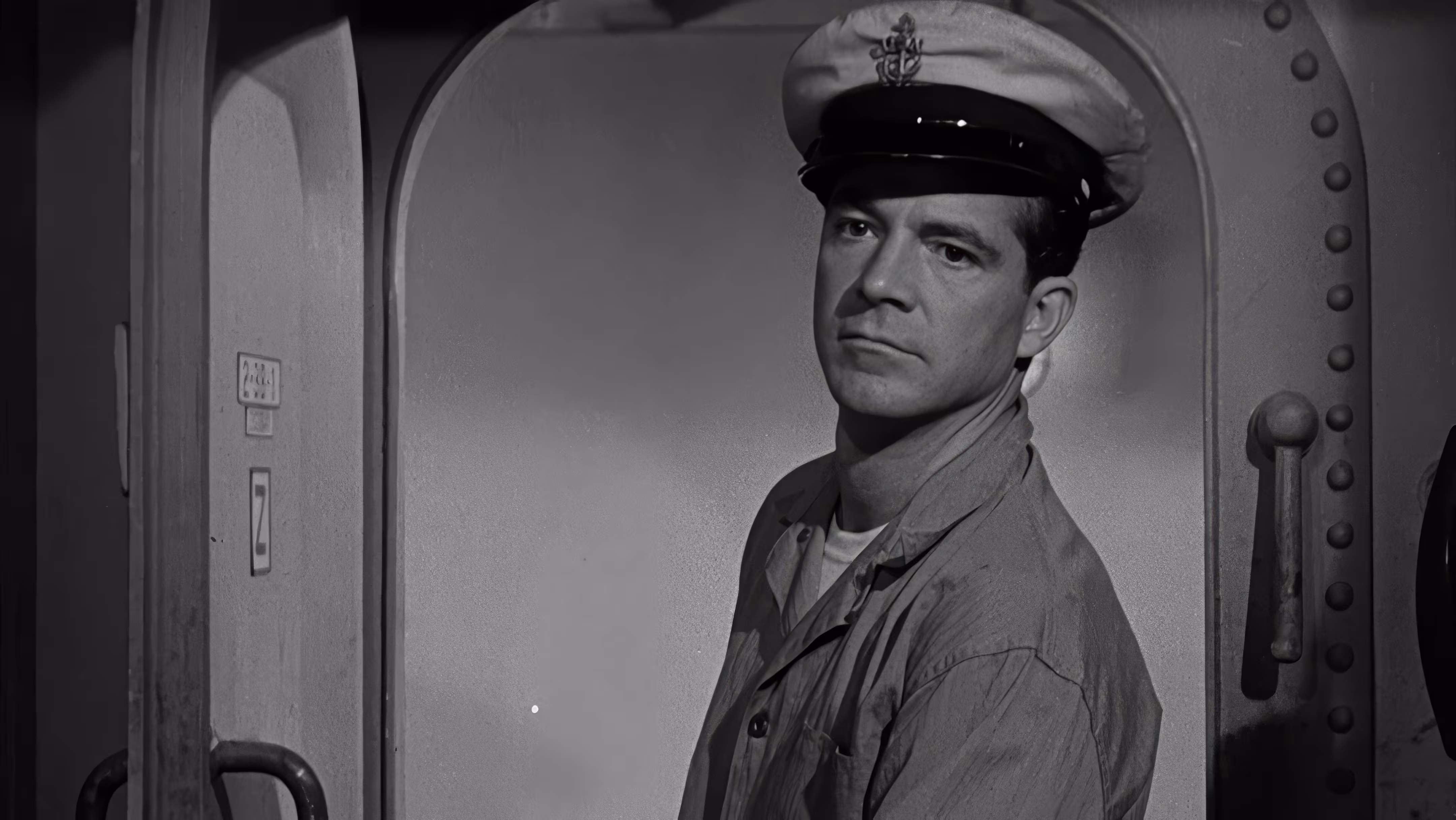 Robert Rockwell wearing Longines in The Frogmen