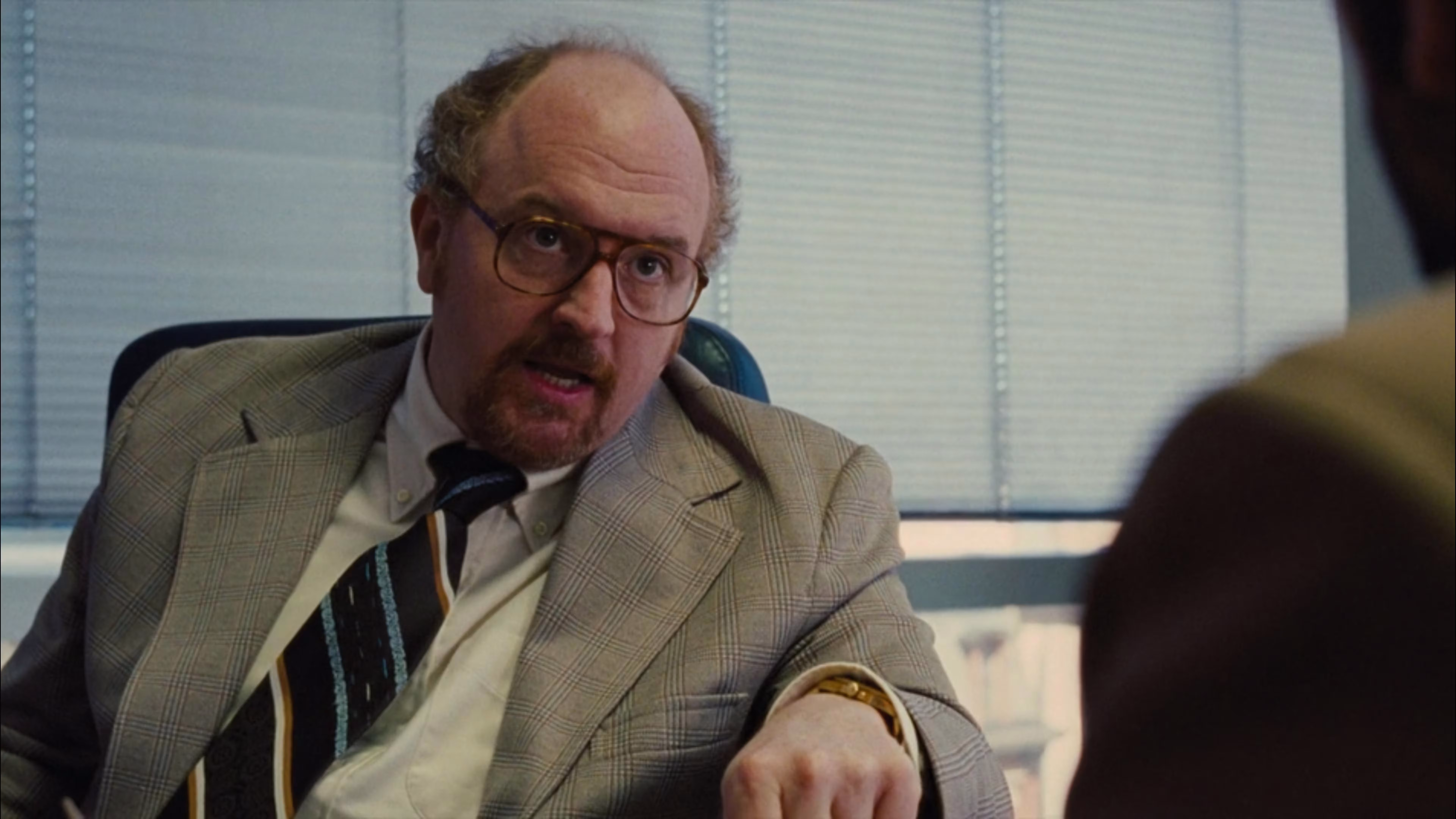 Louis C.K. wearing Rolex GMT-Master II in American Hustle