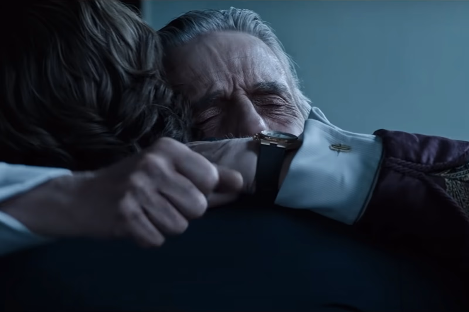 Jeremy Irons wearing Vacheron Constantin Overseas in House of Gucci
