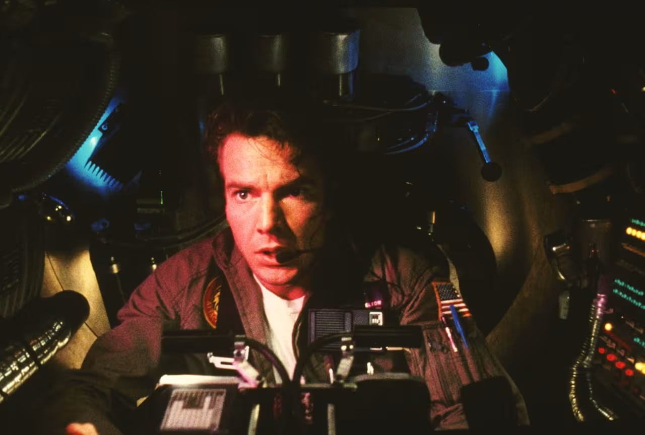 Dennis Quaid wearing Omega Speedmaster Professional in Innerspace