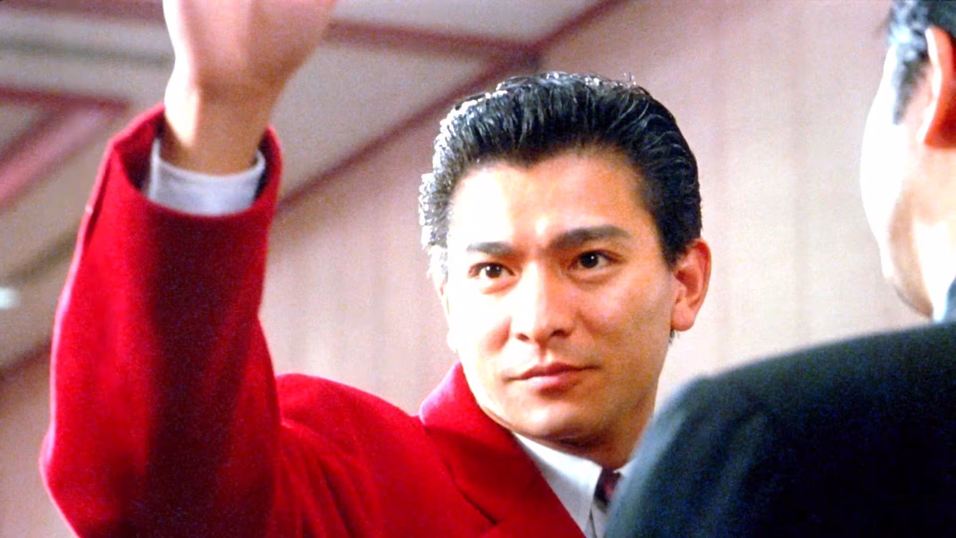 Andy Lau wearing Rolex Day-Date in God of Gamblers II